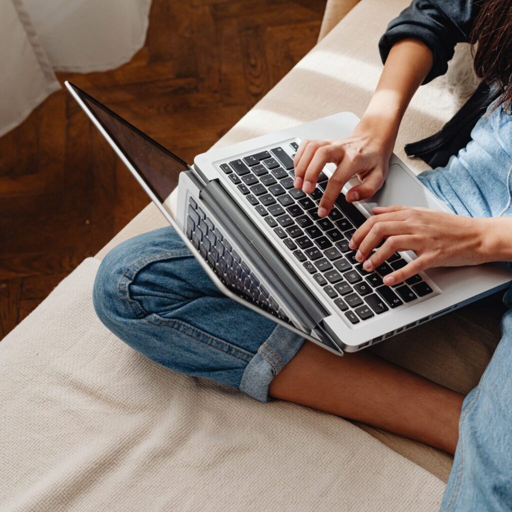 San Antonio blogging guide 2026 photo of person typing on laptop conducting SEO research.