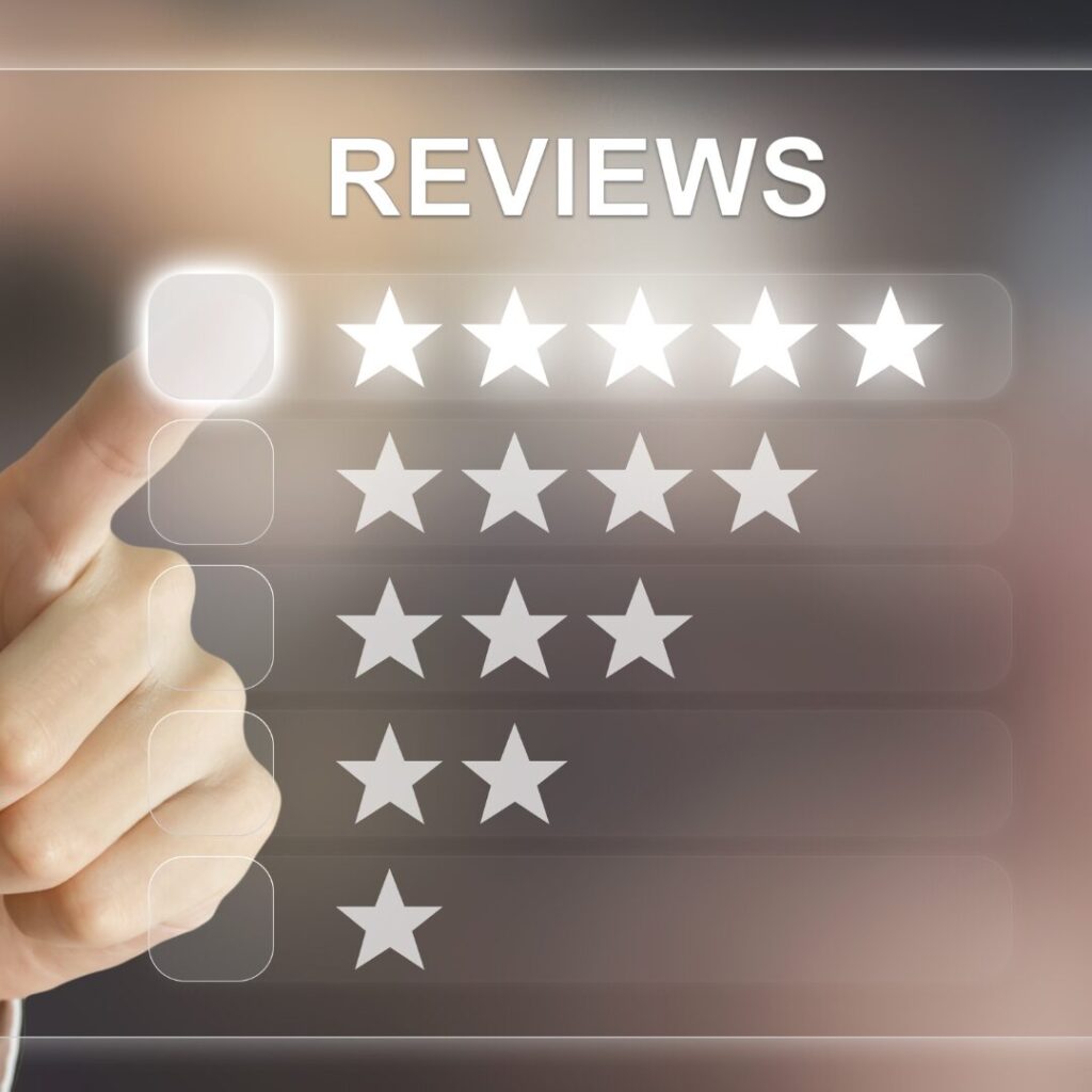 A photo of a finger clicking on a 5 star review. 